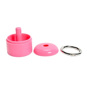 Detailed components of a pink jewelry storage box including base lid and metal spring ring