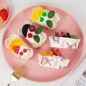 5-piece artificial fruit cupcake set with realistic berries on a pink ceramic plate