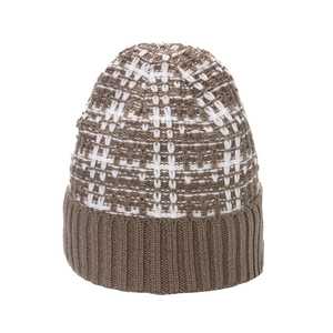 Detailed texture of brown and white checkered knit beanie with ribbed cuff for winter
