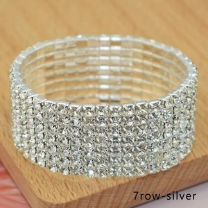 Macro shot of 7-row silver stretch bridal bracelet with shimmering crystal rhinestones