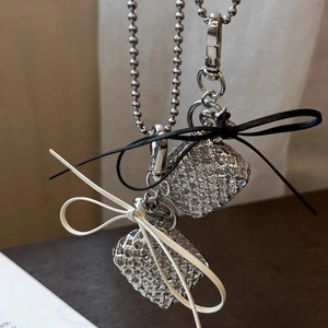 Silver woven heart bag pendant necklace with crystals and black or white ribbon bow