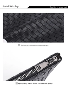 Detail of woven black leather texture and gunmetal zipper on men's business clutch bag