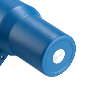 Detail view of the matte blue insulated tumbler bottom with smooth stainless steel base