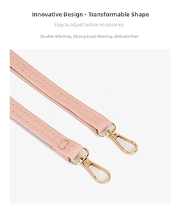 Pink PU leather shoulder strap detail featuring reinforced double stitching and gold buckle
