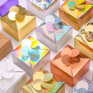 Various laser holographic and matte gift boxes with flower shaped top closures