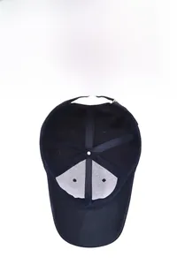 Detail view of the breathable inner structure and adjustable metal buckle of the blue baseball cap