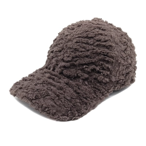 Close-up of thick coffee brown plush teddy fleece baseball cap showing soft texture