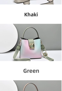 Detail view of stylish gradient bucket bag with chic wide woven shoulder strap and golden buckle