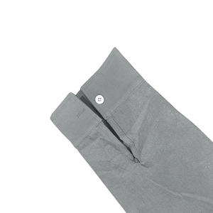 Detail of single-button cuff on grey linen blend long sleeve shirt with white button