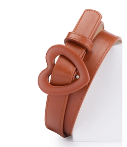 Detailed close-up of brown PU leather belt featuring a heart-shaped wrapped buckle