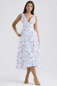 Detailed view of deep V-neckline and waist design on floral print summer maxi dress