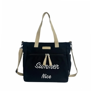 Large capacity black canvas tote bag with beige straps and Summer Nice embroidery detail