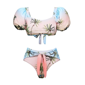Detail of high waist bikini bottom with wide tie and tropical palm print gradient
