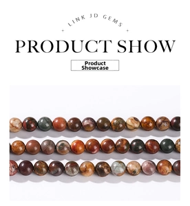 Detailed view of polished natural Picasso stone round beads with multicolor mixed textures
