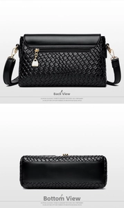 Detailed back view of a black woven crossbody bag showing metal zipper and texture