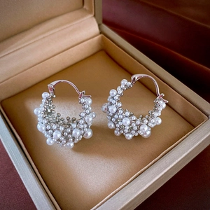 French vintage gold plated C-shape hoop earrings with white pearls in a jewelry box