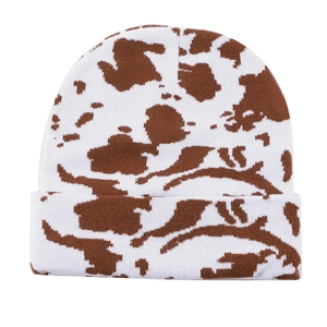 Detail of soft leopard pattern knitted beanie showing premium warm winter fabric texture