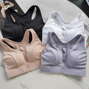 Flat lay of high-impact sports bras with front zippers and wide racerback straps