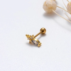 Macro shot of gold stainless steel stud earring with marquise zircon and ball screw back
