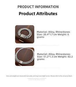 Macro view of silver alloy Cuban link necklace and bracelet set with sparkling rhinestones
