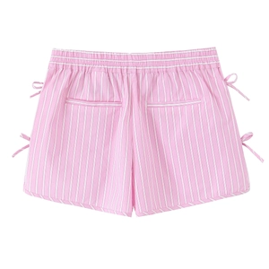 Detail of pink striped poplin shorts featuring elastic waist and side bow accents