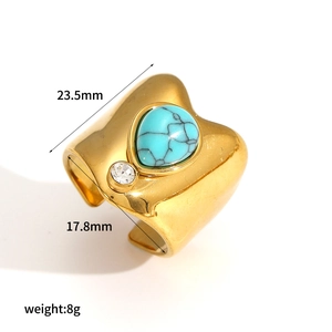 Detailed view of teardrop turquoise ring with zirconia setting showing 23.5mm height dimension