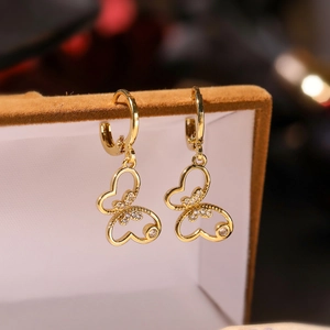 Elegant 18K gold-plated butterfly earrings with zircons displayed on a jewelry box