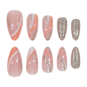 Pink and coral almond press-on nails with wave lines, glitter accents and hand-painted stars