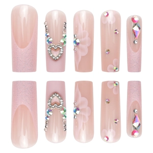 Pink matte french long coffin press-on nails with 3D heart charms and floral accents