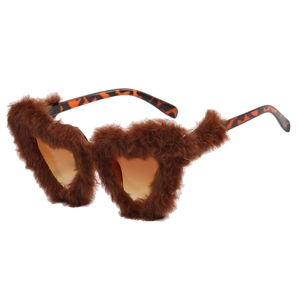 Retro heart-shaped sunglasses with brown faux fur trim and tortoiseshell temples