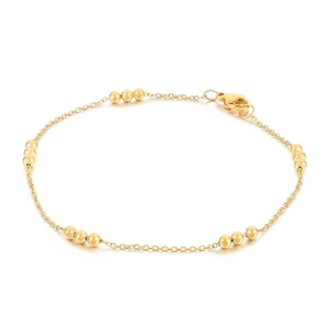 Minimalist titanium steel beaded bracelet in gold finish with elegant lobster clasp