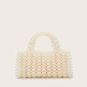 Borsa a mano artigianale in perle bianco crema con trama 3D e manico superiore