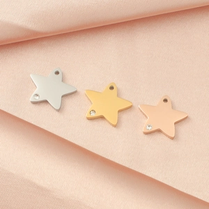 Star-shaped stainless steel pendants in silver, gold, and rose gold with crystal inlay