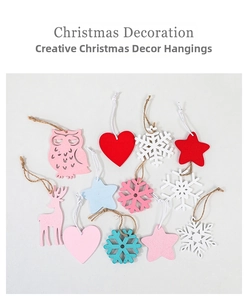 Flat lay of colorful wooden Christmas ornaments featuring owls, stars, and snowflakes