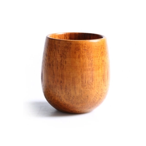 Deep brown carbonized wooden cup with natural grain and smooth belly shape