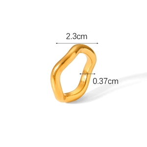 Detailed view of gold irregular wavy ring showing 2.3cm diameter and 0.37cm width specs