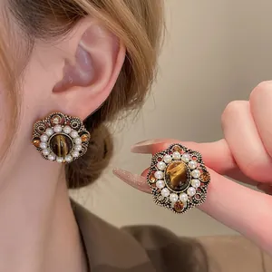 Vintage floral drop earrings with pearls and tiger eye stone in gold-tone setting