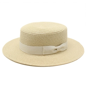 Elegant beige straw boater hat with matching ribbon and bow for women's sun protection