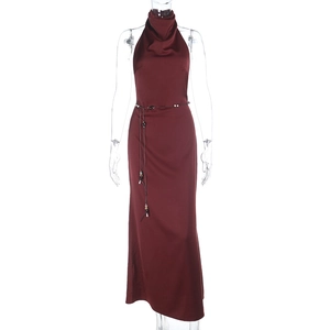 Detail of burgundy satin halter dress showing elegant draped neckline and slim waist tie