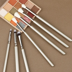 Detail of professional 7pcs champagne gold eye makeup brush set with soft synthetic bristles