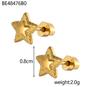 Detail showing 0.8cm gold starfish earrings with radial texture and 2.0g weight