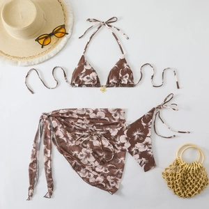 Three-piece bikini set with brown hibiscus floral print and gold buckle detail