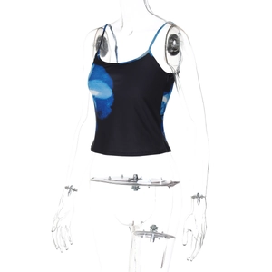 Detail view of abstract blue smoke print on black stretch crop top fabric