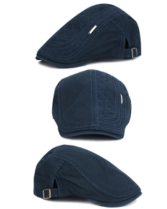 Three-view detail of a navy cotton ivy cap with metal buckle and decorative stitching