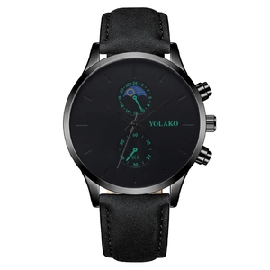 Fashionable men's quartz watch with black leather strap and green markers on dial