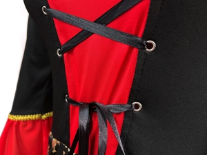 Detail of female pirate costume featuring red and black lacing and gold braided trim