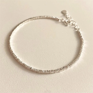 Close-up of S925 sterling silver beaded bracelet with lobster clasp and extension chain