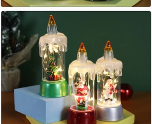 Three Christmas LED candle lights featuring Santa, Snowman, and Tree with warm glow