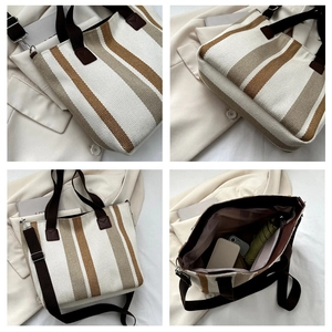 Detail view of striped canvas tote bag showing interior capacity and bottom construction
