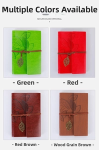 Detailed view of four vintage PU leather leaf-pattern notebooks with metal pendants